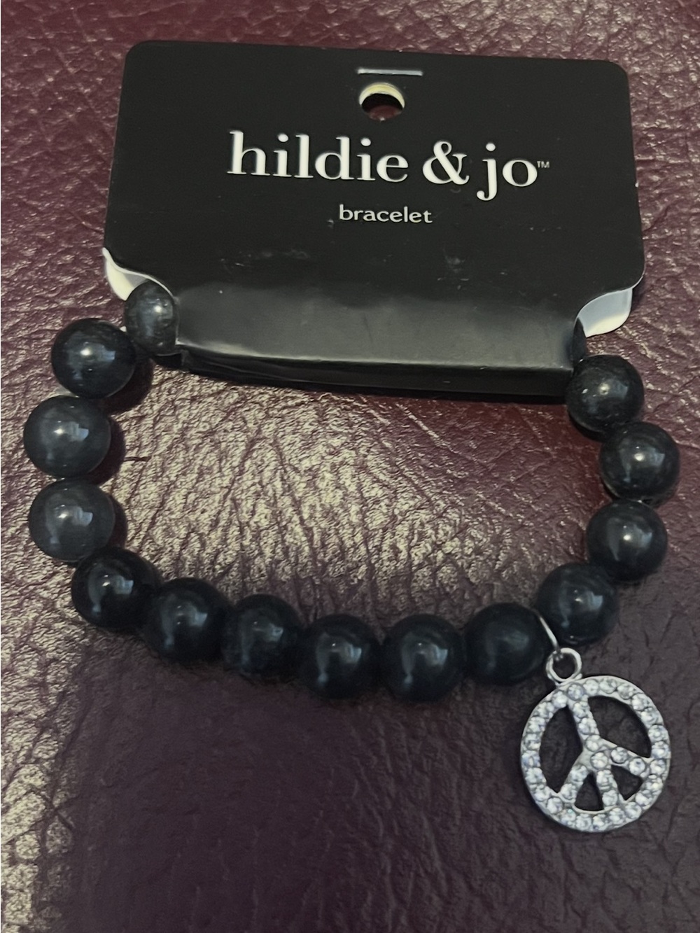 hildie & jo Black Beaded Bracelet with Rhinestone Peace Charm